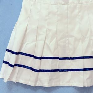 Juniors white and navy tennis skirt